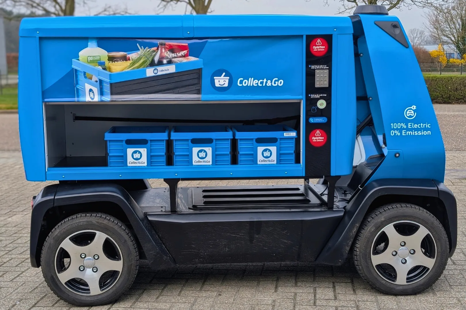 Close-up of GO Bot cargo area showing grocery storage compartments for last-mile delivery operations